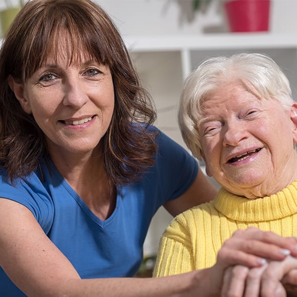 Caring nurse with patient